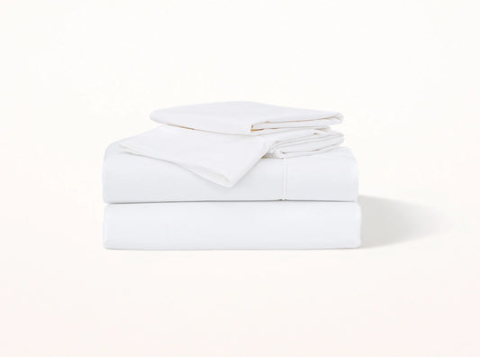 Organic cotton percale embroidered sheet set in white - crisp luxury bedding made in Portugal
