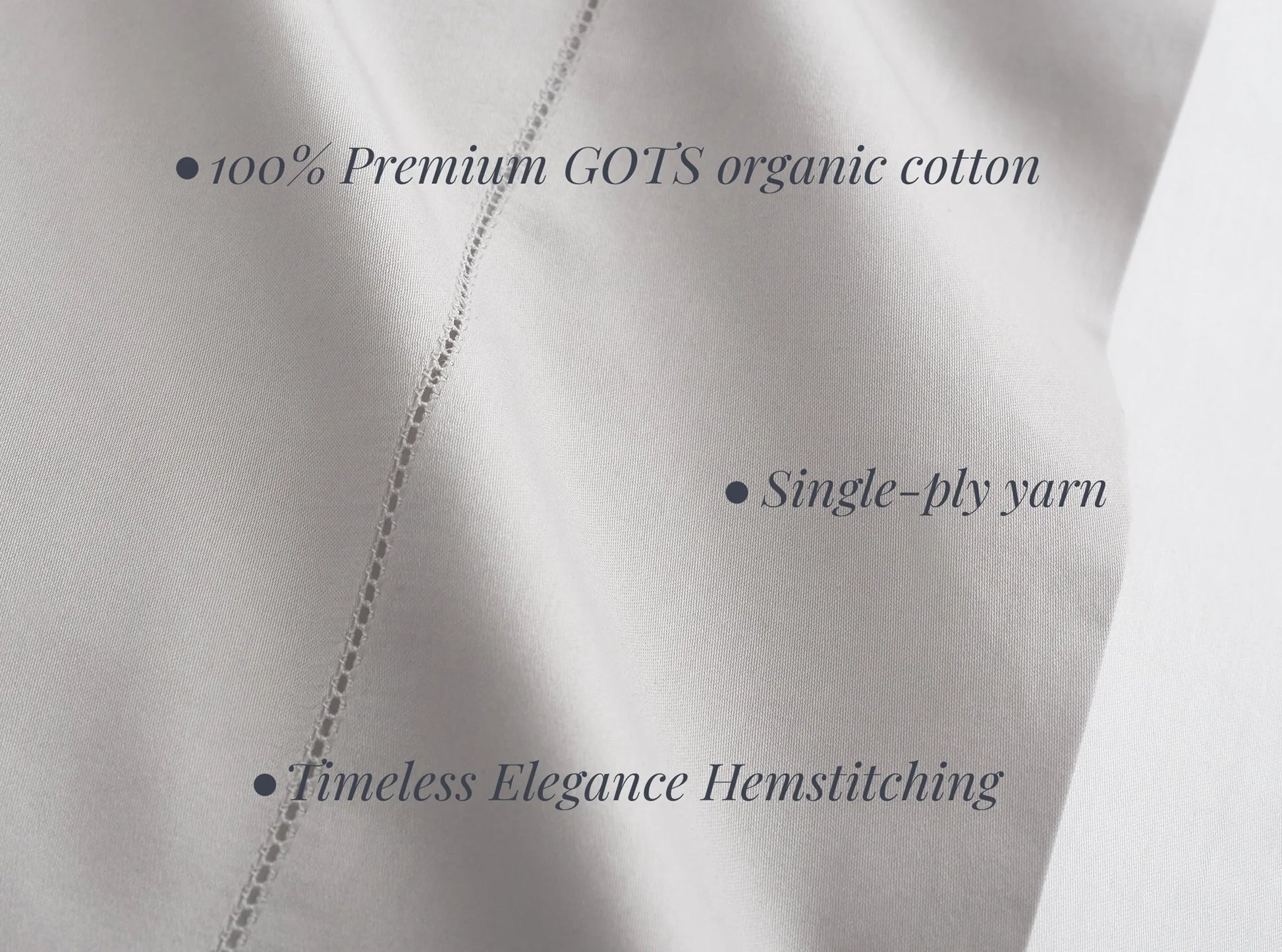 Buttery soft texture of organic sateen sheets in quiet gray - premium single-ply cotton