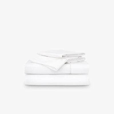 Close-up detail of the percale fabric, showcasing the smooth, crisp texture and fine stitching of the Classic White Percale Sheet Set, made from 100% organic cotton for breathable comfort and durability.