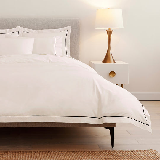  This elegant duvet cover has the sophisticated look and feel of a luxury hotel cover. It is woven with ultra-breathable 100% long-staple GOTS-certified organic cotton percale, providing a cool and comfortable night's sleep. 